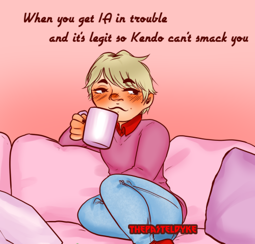 Monoma from the ankles up, curled up on a couch with a mug in his right hand, looking smug. He's wearing a purple-pink pullover ver a red button up and light blue jeans. You can see the heel of a red sock at the bottom of the frame. The couch is light pink, the background is peach.