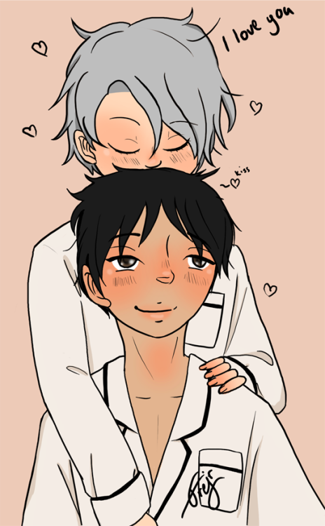 Yuuri and Victor from Yuuri on Ice, dressed in matching white pajamas. Victor is standing behind Yuuri, kissing him on the top of the head while Yuuri looks up at him with a smile.