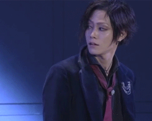 Amane from Messiah Project looknig over his shoulder.