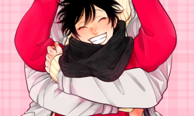 Momo from Yatamomo with Yata's arms wrapped around him from behind. Yata's head is out of frame.